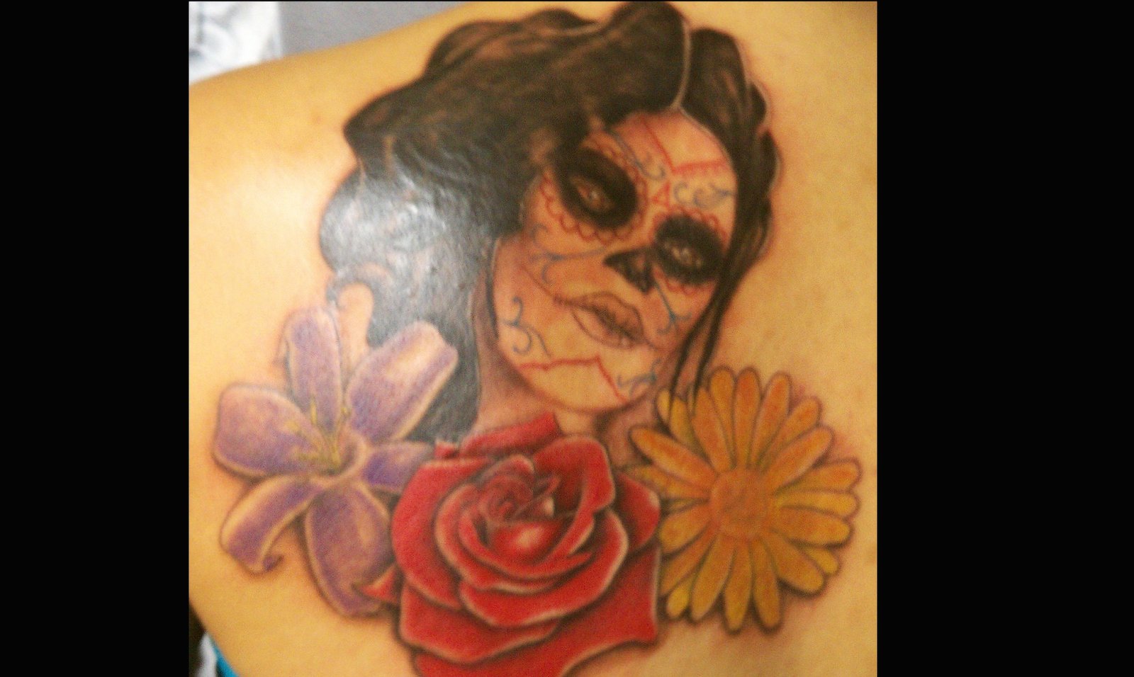 Color tattoo artwork by Blindside Tattoo