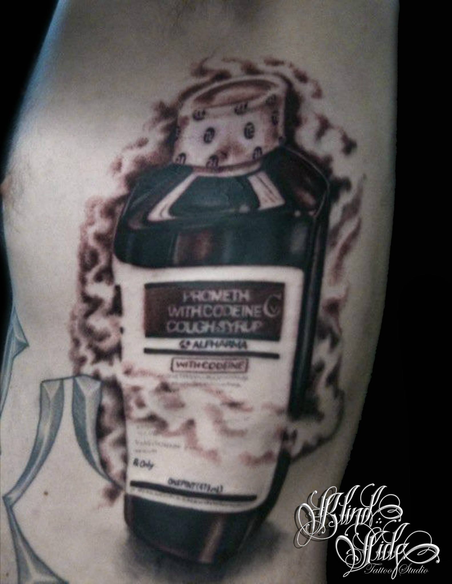 Black & grey tattoo artwork by Blindside Tattoo