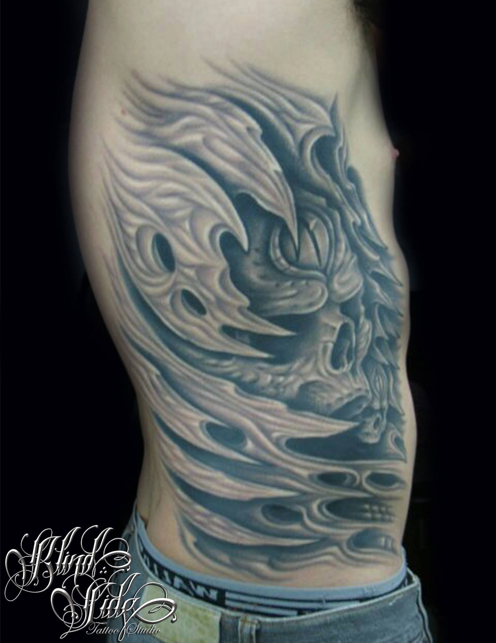 Black & grey tattoo artwork by Blindside Tattoo